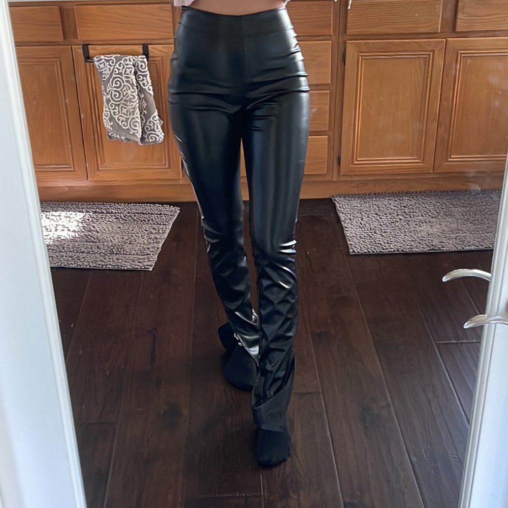 Black leather flare pants